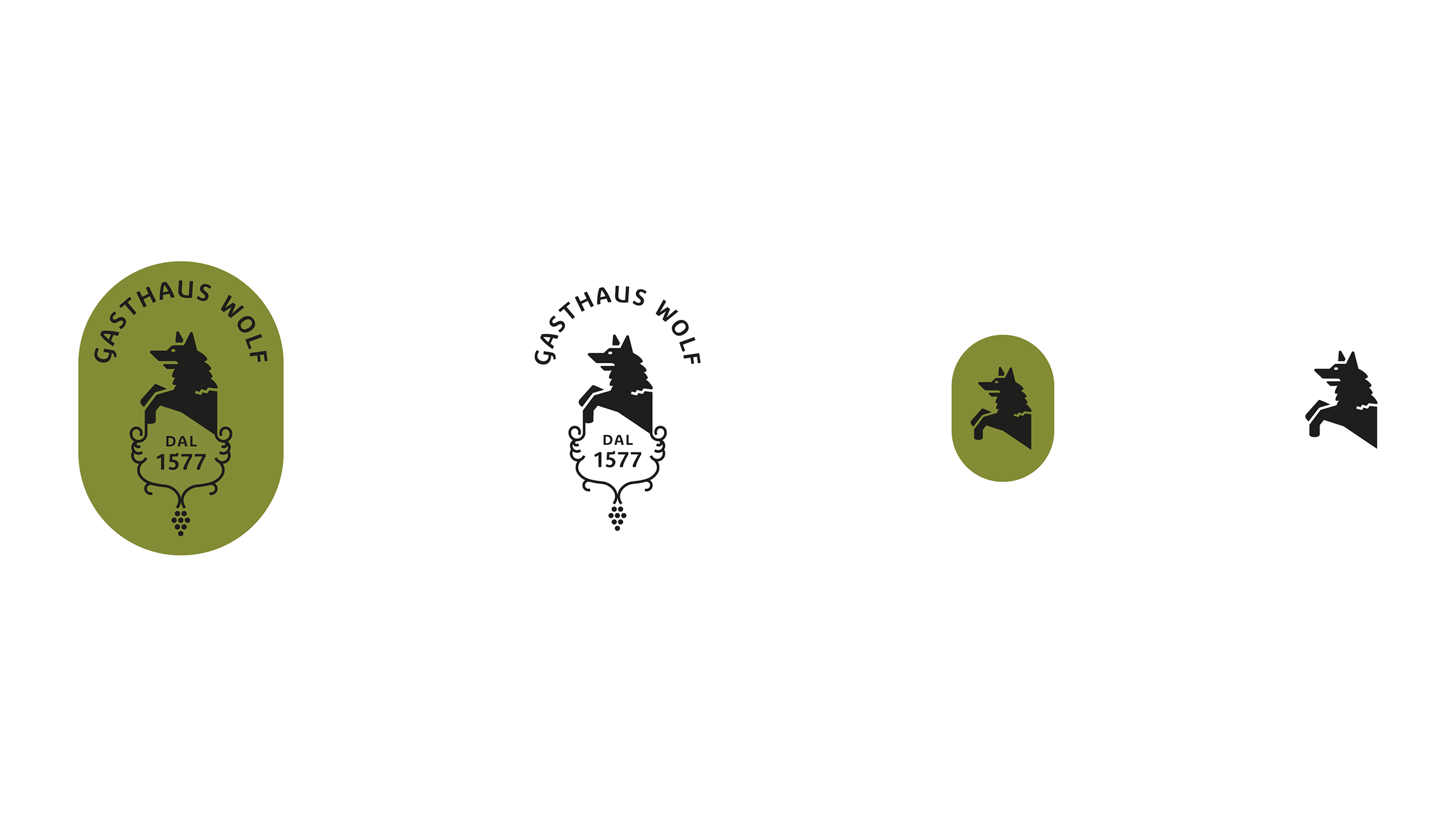 Vier Varianten des Logos des Gasthauses Wolf.
